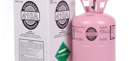 11.3kg R410A refrigerant gas tank with protective cardboard packaging for safe shipping.