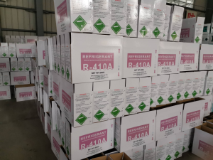 Bulk inventory of 800g R-410A refrigerant gas cylinders in a warehouse for wholesale distribution.